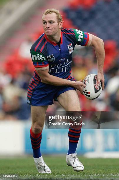 Luke Walsh of the Knights looks to pass during the round 13 NRL match between the Newcastle Knights and the Wests Tigers at EnergyAustralia Stadium...