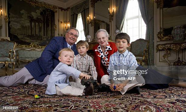 Danish Queen Margrethe and Prince Consort Henrik pose with three of their grandchildren Prince Christian, Prince Felix and Prince Nikolai at the...