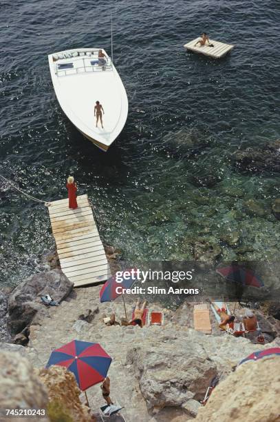 Magnum motorboat belonging to Count Filippo Theodoli arrives at the private jetty of the Il Pellicano Hotel in Porto Ercole, Italy. August 1973.