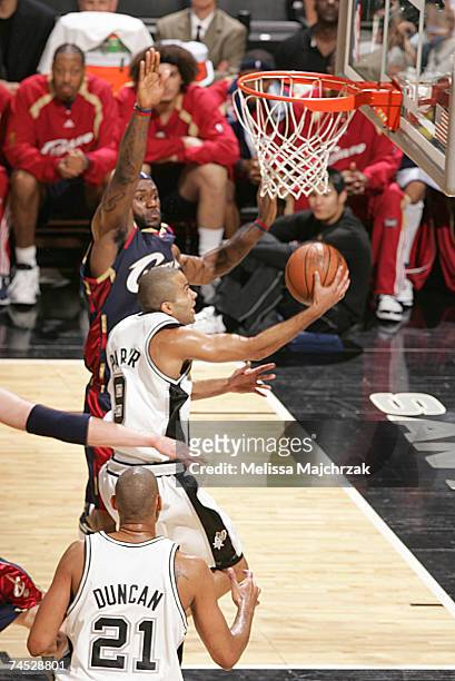 Tony Parker of the San Antonio Spurs shoots against LeBron James of the Cleveland Cavaliers in Game Two of the 2007 NBA Finals at the AT&T Center on...