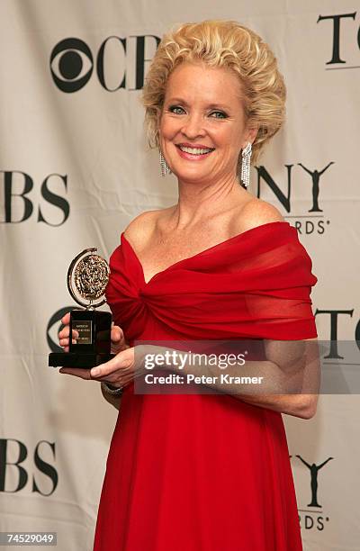 Actress Christine Ebersole poses in the press room with the award for "Best Performance by a Leading Actress In A Musical" for "Grey Gardens" at the...