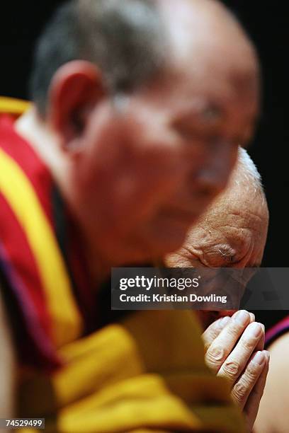 Monks pray during the Dalai Lama's Buddhist blessing - White Tara Long Life Empowerment at Geelong Arena June 11, 2007 in Melbourne, Australia. The...