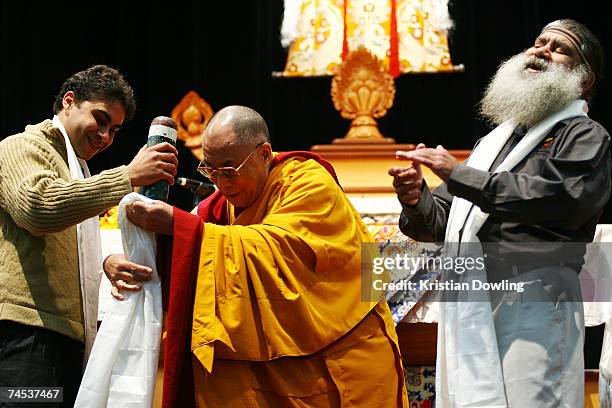 The Dalai Lama blesses a digieridoo instrument during his Buddhist blessing ? White Tara Long Life Empowerment at Geelong Arena on June 11, 2007 in...
