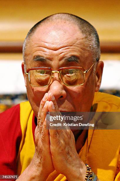The Dalai Lama prays during his Buddhist blessing ? White Tara Long Life Empowerment at Geelong Arena on June 11, 2007 in Melbourne, Australia. The...