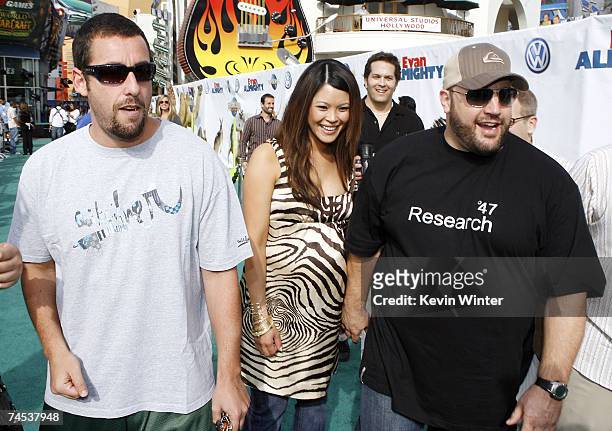 Actors Adam Sandler , Kevin James and his wife Steffiana De La Cruz arrive at the premiere of Universal Picture's "Evan Almighty" at the Gibson...