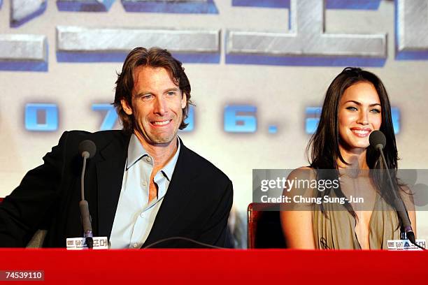 Film director Michael Bay and actress Megan Fox attend a press conference to promote their new film "Transformers" on June 11, 2007 in Seoul, South...