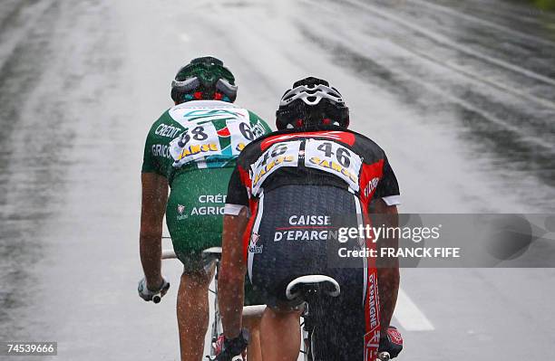 French Remi Pauriol and compatriot Nicolas Portal rides in the pack during the Dauphine Libere Criterium first stage, 11 June 2007 between Grenoble...