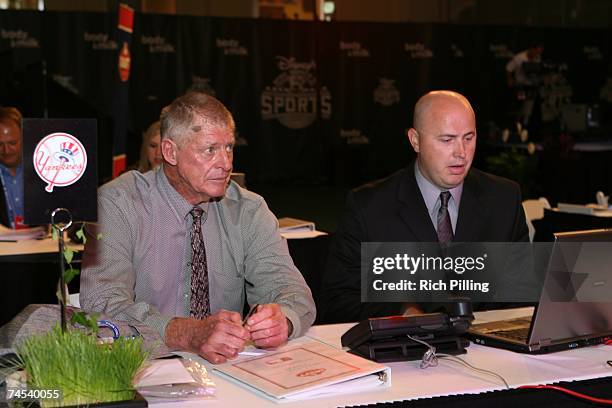 Frank Howard, left and Mike Thurman of the New York Yankees look on during the 2007 First-year player draft at The Milk House in Disney's Wide World...