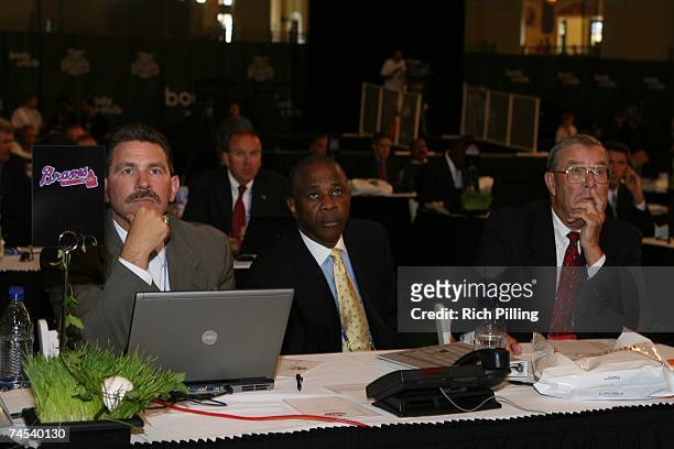 Paul Snyder, Ralph Garr and Kurt Kemp of the Atlanta Braves look on during the 2007 First-year player draft at The Milk House in Disney's Wide World...