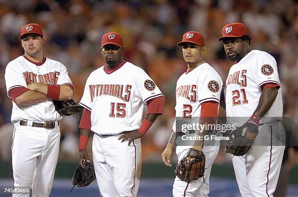 Ryan Zimmerman, Cristian Guzman, Felipe Lopez, and Dmitri Young of the Washington Nationals during a pitching change against the Pittsburgh Pirates...