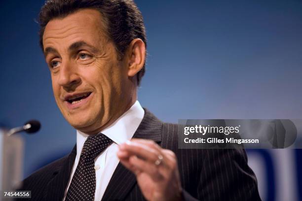 Party French presidential candidate Nicolas Sarkosy addresses supporters at a rallly during which he laid out his position on immigration and the...