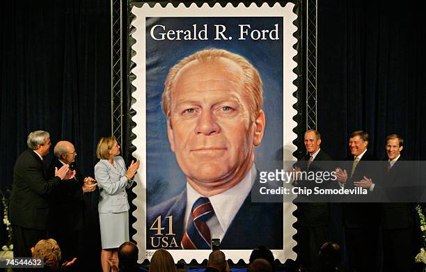 Postmaster General Jack Potter unveils the new commemorative stamp with the image of former U.S. President Gerald R. Ford, along with Vice President...