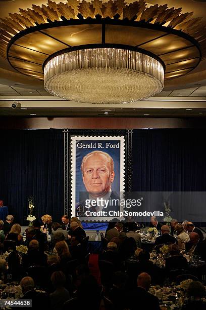 The new commemorative stamp with the image of former U.S. President Gerald R. Ford is unveiled during the Ford Foundation reception and dinner June...