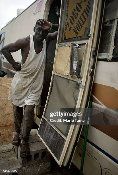 Palazzola Simmons stands in the doorway of the old motor home he is currently living in with three other people in the Lower Ninth Ward June 10, 2007...