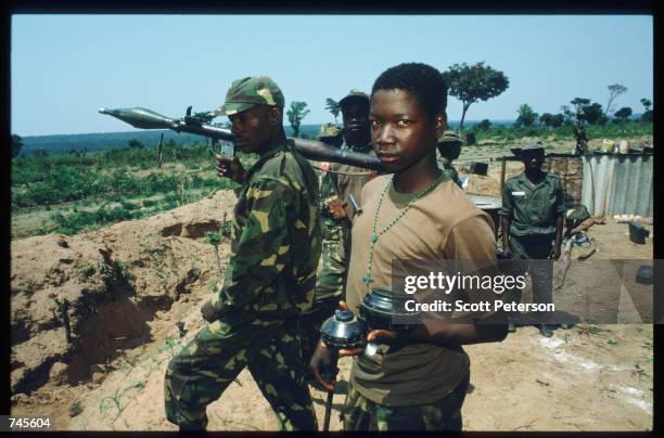 Government soldier displays a land mine October 25, 1993 in Menogue, Angola. Angolan rebels have continued the civil war after losing elections on...