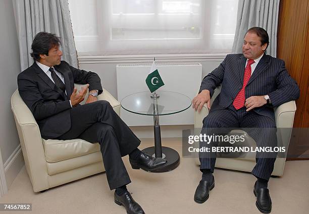 London, UNITED KINGDOM: Former Pakistani Prime Minister Nawaz Sharif and ex opposition politician and cricketer Imran Khan meet in central London, 12...