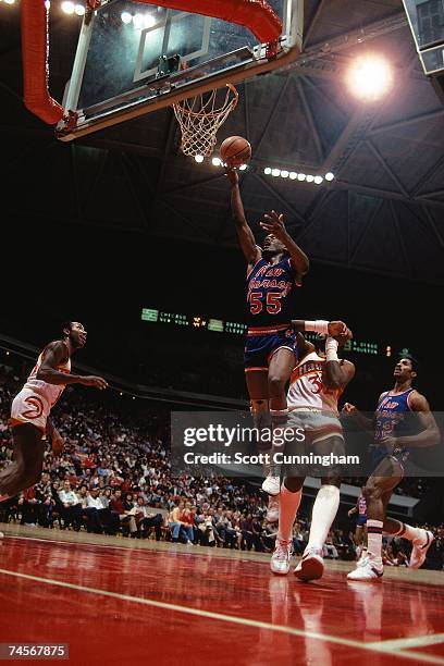 Albert King of the New Jersey Nets elevates for a dunk against the Atlanta Hawks during a 1983 NBA game at the Omni Coliseum in Atlanta, Georgia....