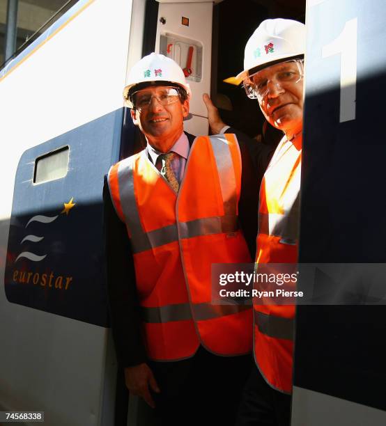 Lord Sebastian Coe, Chairman of LOCOG, and Denis Oswald, IOC Chairman, pose on a Eurostar train during IOC Coordination Commission visit to London at...