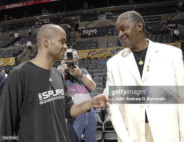 Tony Parker of the San Antonio Spurs chats with his dad Tony Parker Sr. Prior to Game One of the 2007 NBA Finals at The AT&T Center on June 7, 2007...