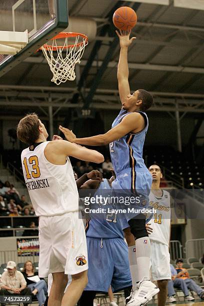 Chris Copeland of the Fort Worth Flyers puts a shot up over Cezary Trybanski of the Tulsa 66ers during the D-League game on March 30, 2007 at Expo...