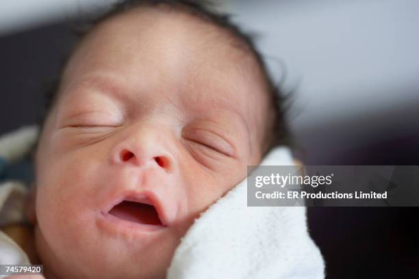 Close Up Of Newborn African Baby Sleeping, Foto de stock
