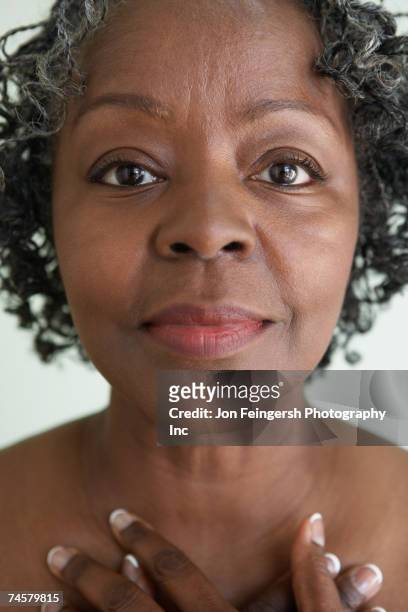 close up of senior african woman - 50 59 years stock pictures, royalty-free photos & images