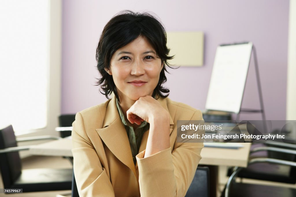 Kazakh businesswoman in conference room