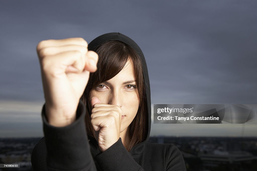 Hispanic woman in fighting stance