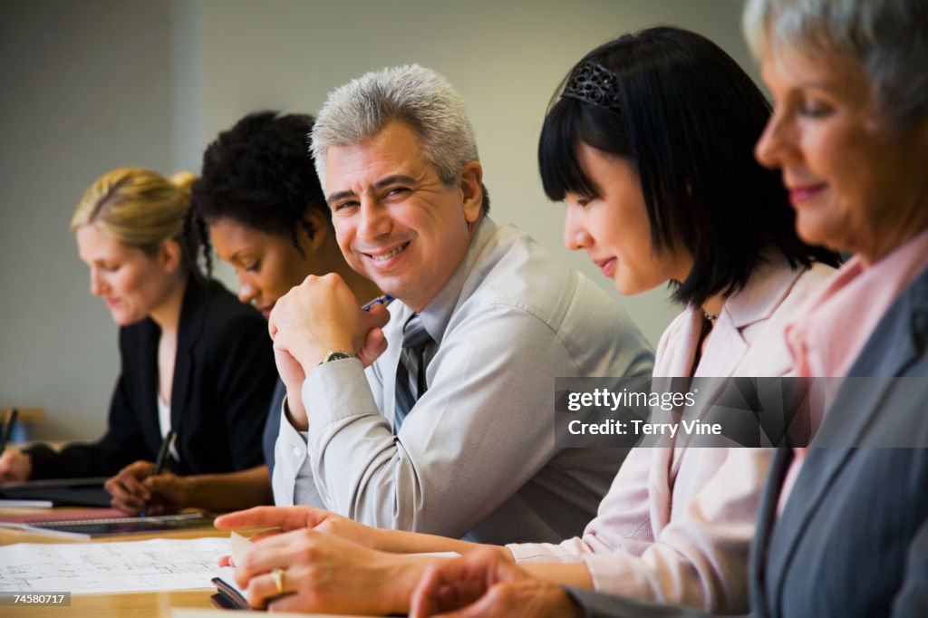 Multi-ethnic businesspeople at meeting