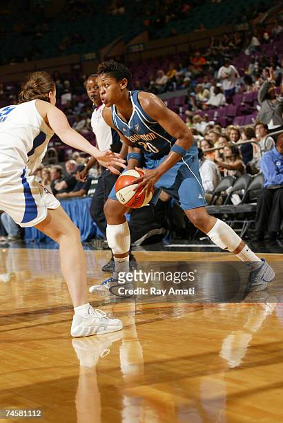 Alana Beard of the Washington Mystics is defended by Erin Thron of the New York Liberty at Madison Square Garden June 12, 2007 in New York City. NOTE...