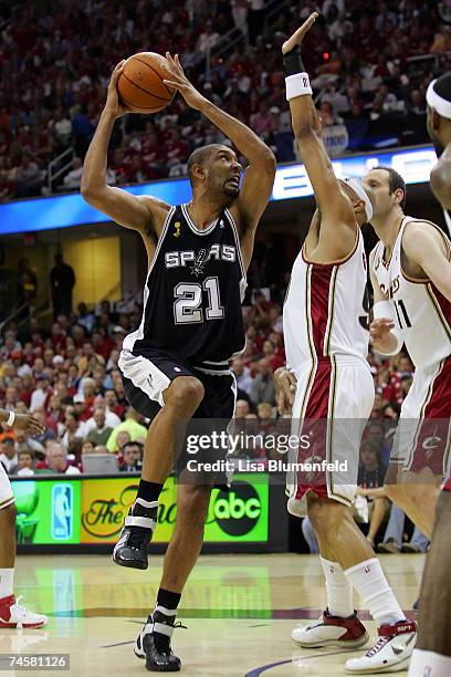 Tim Duncan of the San Antonio Spurs drives to the basket against Drew Gooden of the Cleveland Cavaliers in Game Three of the NBA Finals on June 12,...