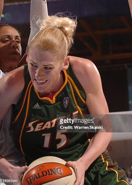 Lauren jackson off the Seattle Storm is defended by Candace Dupree of the Chicago Sky at the UIC Pavilion June 12, 2007 in Chicago, Illinois. Seattle...