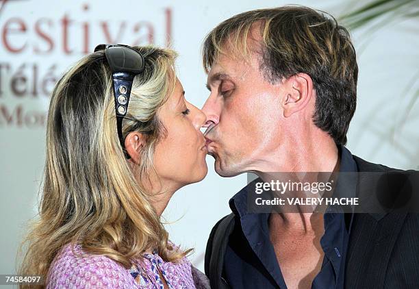Actor of US series "Prison Break" Robert Knepper kisses French actress Rachel Bourlier , 13 June 2007 during a photocall for the television series at...