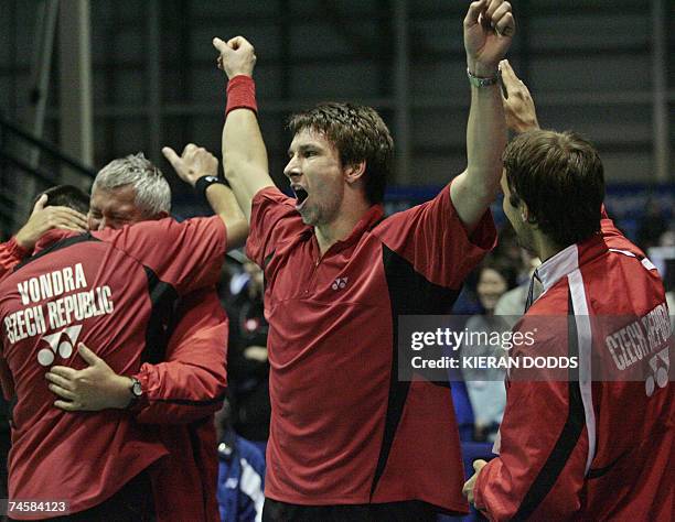 Glasgow, UNITED KINGDOM: Badminton player Petr Koukal of the Czech Republic celebrates after competing against Bulgaria's Vladimir Metodiev and...