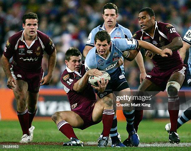 Greg Bird of the Blues takes on the Maroons defence during game two of the ARL State of Origin series between the New South Wales Blues and the...