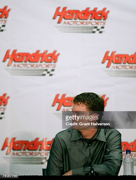 Dale Earnhardt Jr., driver of the Budweiser Chevrolet, announces that he will drive for Hendrick Motorsports next season during a news conference at...