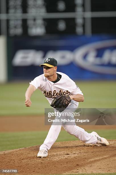 Chad Gaudin of the Oakland Athletics pitches during the game against the San Francisco Giants at the McAfee Coliseum in Oakland, California on May...