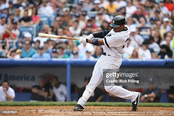 Robinson Cano of the New York Yankees bats during the game against the Pittsburgh Pirates at the Yankee Stadium in the Bronx, New York on June 9,...