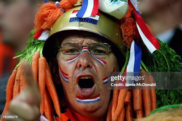 Netherlands fan shows his colours during the UEFA U21 Championship, group A match between Netherlands U21 and Portugal U21 at the Euroborg Stadium on...