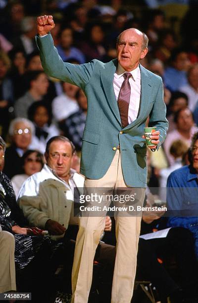 Jack Ramsay, head coach of the Portland Trail Blazers calls a play from the sidelines during a 1986 NBA game. NOTE TO USER: User expressly...