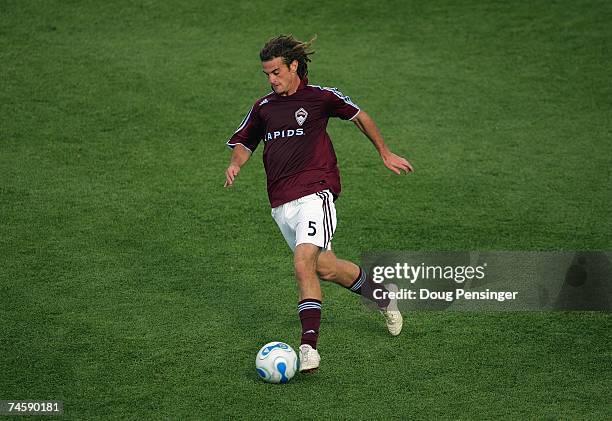 Kyle Beckerman of the Colorado Rapids moves the ball across midfield against the Los Angeles Galaxy during their MLS match at Dick's Sporting Goods...