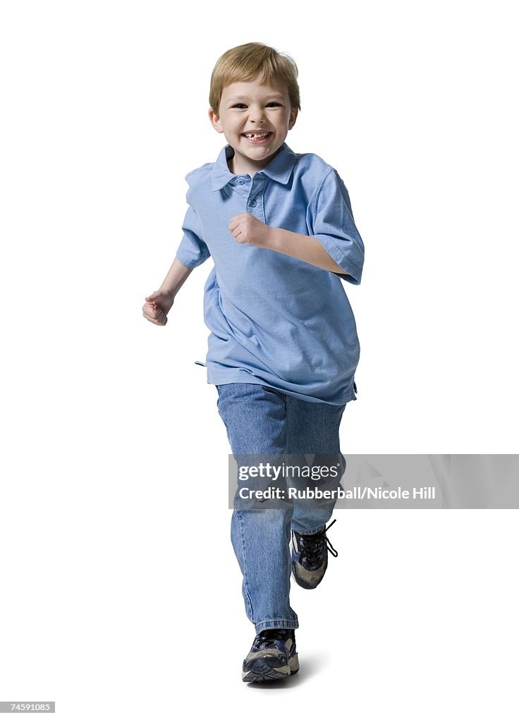 Boy running and smiling