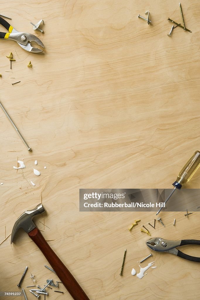 Tools and fasteners on hardwood floor