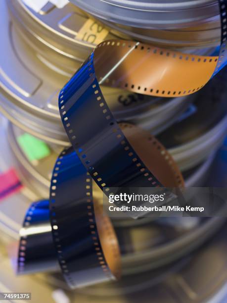 detailed view of coiled film and film canisters - film canister stock pictures, royalty-free photos & images
