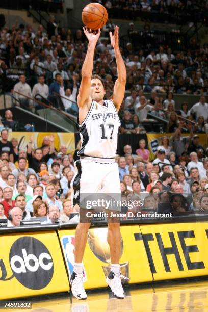 Brent Barry of the San Antonio Spurs shoots a jump shot against the Cleveland Cavaliers in Game Two of the NBA Finals at the AT&T Center on June 10,...