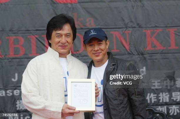 Hongkong actor Jet Li and Jackie Chan attend the press conference of the "Kings of KungFu" on June 14, 2007 in Hengdian, Zhejiang Province, China.