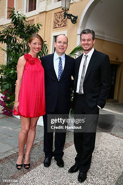In this handout released by the 2007 TV Festival Organization, actress Rebecca Gayheart, Prince Albert II of Monaco and actor Eric Dane pose in the...
