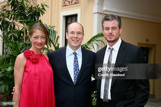 In this handout released by the 2007 TV Festival Organization, actress Rebecca Gayheart, Prince Albert II of Monaco and actor Eric Dane pose in the...