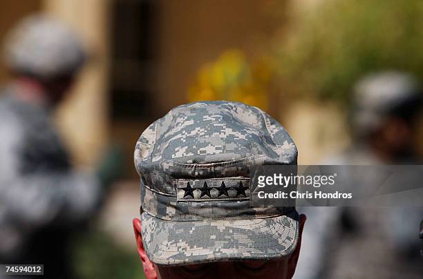 The cap of General David Petraeus, commander of U.S. Military forces in Iraq, shows his four star rank June 14, 2007 in Baghdad, Iraq. Baghdad is...