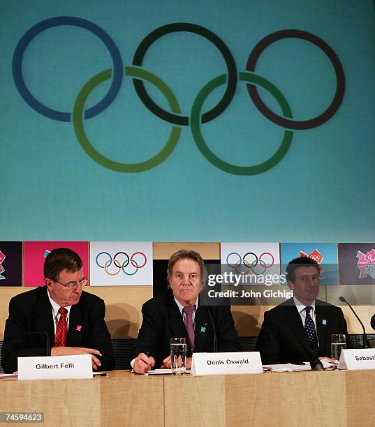 International Olympic Committee members Gilbert Felli and Denis Oswald join London 2012 Organizing Committee chairman, Lord Sebastian Coe to address...